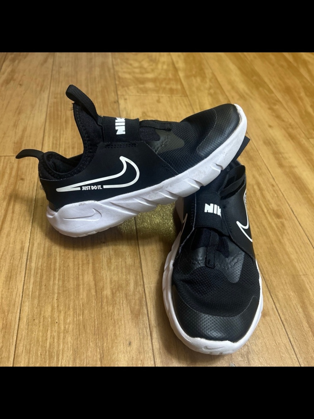 Nike Kids Black and White Slip-On Athletic Sneakers